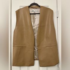 Size M Stain On The Back As Seen On Pic New, Tag Just Removed. Never Worn Brown Leather Vest For Workwear, Brown Leather Spring Vest, Brown Leather Vest For Spring, Brown Spring Vest For Workwear, Brown Vest For Workwear In Spring, Brown Spring Workwear Vest, Zara Beige Vest For Fall, Classic Brown Vest For Spring, Chic Leather Vest For Fall