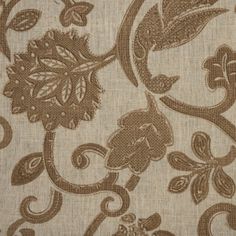 an image of a fabric with flowers and leaves in brown colors on white background, closeup