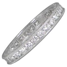 This exquisite platinum wedding band boasts a width of 3mm and features a dazzling display of 1.10 carats of channel-set diamonds. The sides are adorned with enchanting scroll-motif engravings, adding a touch of romance to this timeless piece. Ring Size: 6.5 US, Resizable Metal: Platinum Stone: Diamond Style: Art Deco Width Of Band: 3.00mm Platinum Wedding Band, Engraving Art, Platinum Wedding, Art Deco Diamond, Diamond Fashion, Diamond Wedding Bands, Diamond Wedding, Timeless Pieces, Band Rings