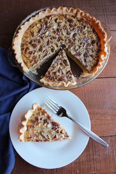 a piece of pie sitting on top of a white plate