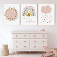 two children's wall art prints with the words you are my sunshine and rainbow