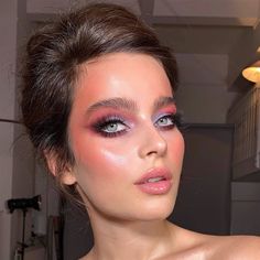 The 80s was also a big time for [link url="https://www.glamourmagazine.co.uk/topic/blusher"]blusher[/link] and [link url="https://www.glamourmagazine.co.uk/article/draping-makeup-trend"]draping[/link] (when colour is applied to the temples). Nikki Makeup shows us how it's done, paired with a pink and purple sunset eye. 80s Makeup Trends, Fuchsia Lipstick, Neon Lips, 80s Trends