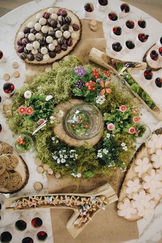 a table topped with lots of different types of food