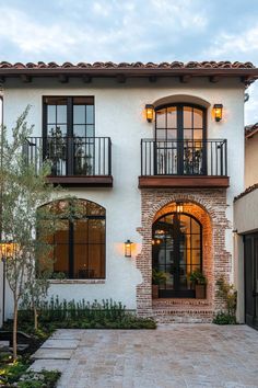 a large white house with lots of windows