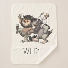 a white blanket with an image of two animals and the words wild on it