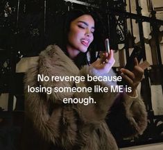 a woman holding a cell phone in her right hand while wearing a fur coat with the caption, no reverse because losing someone like me is enough