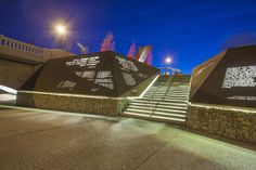 the stairs lead up to an outdoor monument