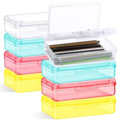 three plastic storage containers with dividers and lids on each side, one is filled with files