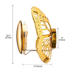 the butterfly wall light is shown with measurements for it's body and wings, which are