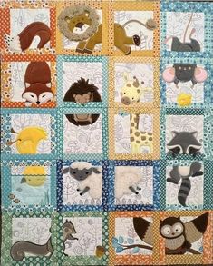 an animal themed quilt with many different animals on it