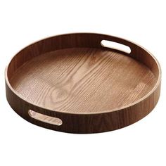 an oval wooden tray with handles is shown on a white background for use as a serving platter