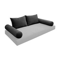 a black and white couch with two pillows on top of it, in front of a white background