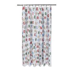 a shower curtain with letters printed on it