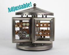 there is a small metal lantern with pictures on it and the words, adjustableable?