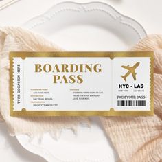 a boarding pass sitting on top of a white plate