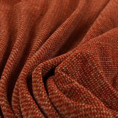 an orange and brown tweed fabric