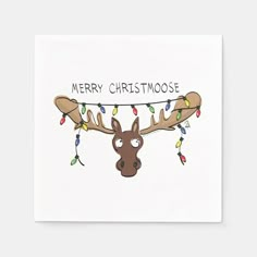 a christmas card with a moose's head and lights hanging from the antlers