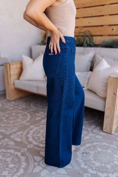 Step into effortless style with the Studio Flare Lou in Dark Vintage Blue by Rollas. These retro-inspired jeans are crafted with a flattering high-rise waist and wide-leg silhouette that elongates your legs, making them a timeless addition to your wardrobe. The vintage-inspired button front and oversized patch pockets add a unique touch to this denim classic, while the soft, slightly stretchy fabric ensures all-day comfort Dark Vintage, Top Sales, Sweater Weather, Stretchy Fabric, Retro Inspired, The Studio, Short Tops, Effortless Style, Jumpsuit Dress