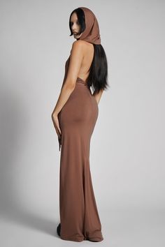 Make them take a second glance. Maxi dress made from luxuriously dense Jersey, featuring an add-on hood that can be draped across the shoulders and over the crown of the head, with plunging halter top neckline. FIT NOTES:Tatianna wears a size Small, 5'9, with a 26" waist.MATERIALS:95% rayon 5% spandexMade in China God Costume, Greek God Costume, Top Neckline, Greek God, Hooded Dress, Steel Grey, The Crown, Halter Top, Dress Making