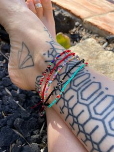 ----- Price per Item----- You can choose between 5 different evil eye anklets. As you can see in the pictures each bracelet has a different color. They are all size adjustable. You can choose between: -Mix pastel colors anklet -Mix red colors anklet -Blue anklet -Black Anklet -Red Anklet⚡️GET 20% OFF NOW⚡️ JOIN AKASHI'S VIP LIST and Shop ⚡️Join Akashi's VIP list for early bird discount access⚡️ Paste into your browser http://eepurl.com/hgCMM1 and follow the simple steps. ⚡️To see more unique jew Handmade Festival Anklets With Ankle Strap, Red Bohemian Anklets As A Gift, Blue Beaded Festival Anklets, Bohemian Blue Anklets For Beach, Red Bohemian Anklets For Beach, Red Anklet, Black Anklet, Evil Eye Anklet, Seed Bead Anklet