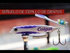 two toothbrushes are sitting on top of a fishing hook with the words colgate in spanish