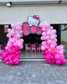 hello kitty balloon arch with pink and white balloons