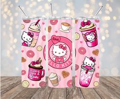 two hello kitty tumblers with pink frosting and donuts on them, one in the