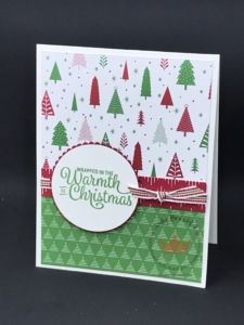 a handmade christmas card with trees on it