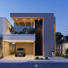 a car is parked in front of a modern house at night with lights on the balconies