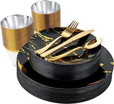 black and gold dinnerware set with matching plates