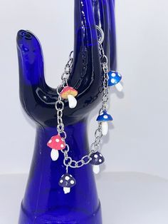 "Show off your pride and carry a little bit of queer forest mushie magic with you at your wrist with this beautiful handsculpted charm bracelet! Every charm is lovingly sculpted from natural clay and then carefully handpainted and sealed with a gloss finish for protection and longevity. This silvertone bracelet comes with six charms in the bisexual Pride flag colors, all just a little different due to their handmade nature. This is part of the magic! The bracelets close with an easy toggle clasp Bisexual Friendship Bracelet, Demisexual Bracelet, Subtle Bisexual Bracelet, Bisexual Necklace, Bisexual Jewelry, Lgbtq Necklace, Non Binary Pride, Bisexual Pride Flag, Pride Flag Colors