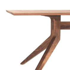 a wooden table with two intersecting legs