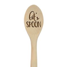 a wooden spoon with the words'let's spoon'written on it and brown lettering