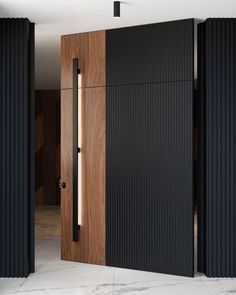 an open wooden door with black slats on the sides and white marble flooring