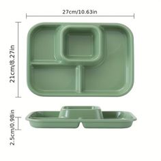 the green divided tray has two compartments and one compartment with an empty cup on it