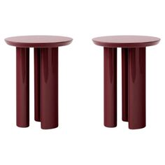 two red tables sitting next to each other