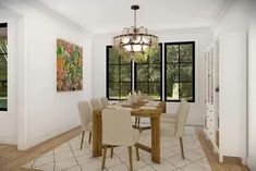 a dining room table with chairs and a chandelier hanging from the ceiling in front of two windows