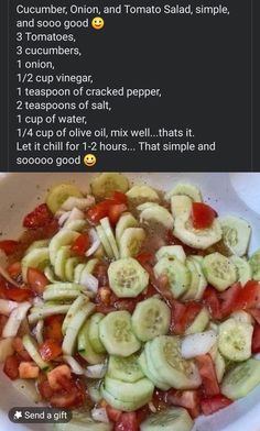 a bowl filled with cucumber, tomatoes and other veggies on top of a table