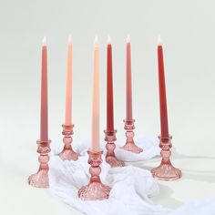 five candles are lined up in a row