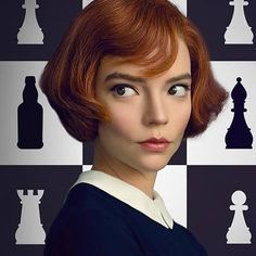 a woman with red hair is standing in front of chess pieces on a black and white wall