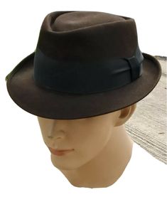 1950s Royal Stetson Men's Fedora Hat 7 1/8. Wear is consistent with age. Vintage Flat Bill Felt Hat For Winter, Vintage Brown Flat Bill Felt Hat, Vintage Fitted Felt Hat With Flat Bill, Vintage Leather Hat With Flat Bill, Vintage Brown Felt Hat With Flat Bill, Vintage Leather Flat Bill Hat, Vintage Brown Fedora For Formal Occasions, Fitted Vintage Brown Fedora, Vintage Fitted Top Hat With Flat Bill