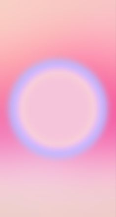 a blurry image of a pink and blue circle