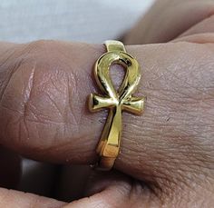 18 kt gold Extravagance Ring decorated with Ankh and Lotus flower. Size: You tell me. Weight: around 2-3 grams. Please give me your phone number to speed shipping, I can't ship without it. Symbolic Ankh Ring As A Gift, Antique Gold Ankh Jewelry, Gold Ankh Shaped Metal Jewelry, Symbolic Ankh Rings For Gifts, Elegant Ankh-shaped Gold Jewelry, Gold Ankh Amulet Jewelry, Unique Ankh-shaped Brass Jewelry, Dope Tattoos, Lotus Flower