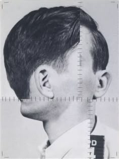 a black and white photo of a man's profile with the same height as his face