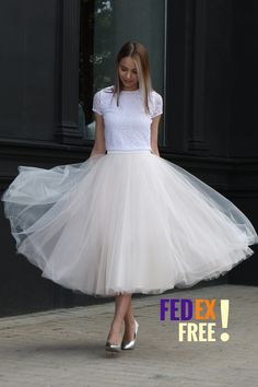 Phone number required for express delivery!! The skirt in front of you is of the utmost quality handiwork. It does NOT make you look fat but it is very fluffy nevertheless (it is indeed so). At the waist tulle is specially arranged in such a way that it does not protrude outwards as on many pictures at other shops that you have probably seen. This skirt will make you happy from the first try - you will feel a princess. I promise! The skirt on the pic (medium volume), colors 3/52/3/52. The skirt Lace Full Skirt For Wedding, Elegant Pleated Full Tulle Skirt, Long Lined Petticoat For Wedding, Flowy Lined Petticoat For Weddings, Summer Wedding Pleated Skirt, White Prom Skirt For Spring, Spring Wedding Pleated Skirt, Summer Wedding Midi Skirt, Flowy Lined Pleated Skirt For Wedding