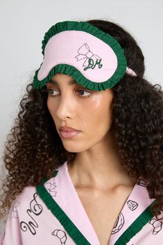 A Damson pyjama eye mask, designed in baby pink and forest green with a hand-illustrated bow print. •Matching pyjamas available •DM embroidery detail •100% organic cotton •Designed in London Pink Symbols, Matching Pyjamas, Damson Madder, Chocolate Babies, Bow Print, Checked Scarf, Hooded Scarf, Pets For Sale, Matching Pajamas