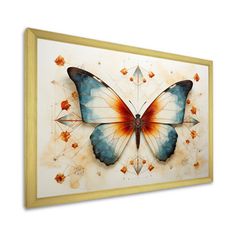 a butterfly with orange and blue wings is hanging on the wall