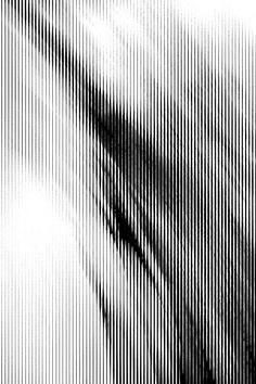 an abstract black and white photo with lines