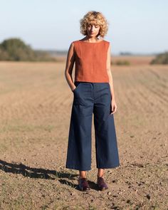 Wide leg trousers made in a thick and stretchy medium weight denim fabric. Wide leg cut, trousers fits neatly at the waist, top stitched carpenter pockets, zip fly with tortoise button fastening. - Handmade in our studio from 98% cotton 2% spandex - Wide legs - Carpenter pockets - Belt loops, zipper and button fastening Legs Outfit, Womens Pants, Clothes Closet, Colored Pants, Pantalon Large, Denim Trousers, Wide Legs, Linen Top, Wide Leg Denim