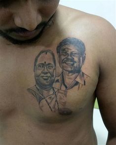 a man's chest with an image of two men on it